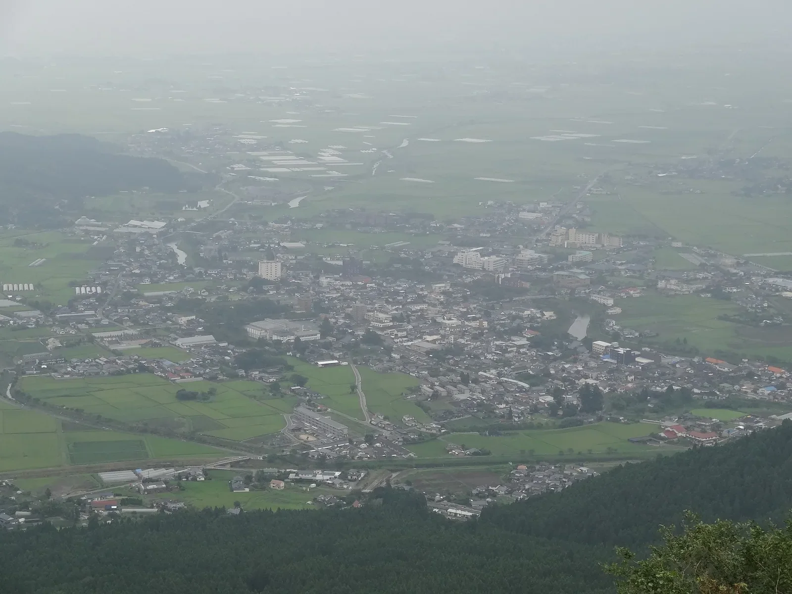 由外輪山方向望向阿蘇市內牧地區與盆地資料照